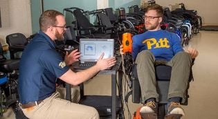 rehab science researchers testing wheelchair