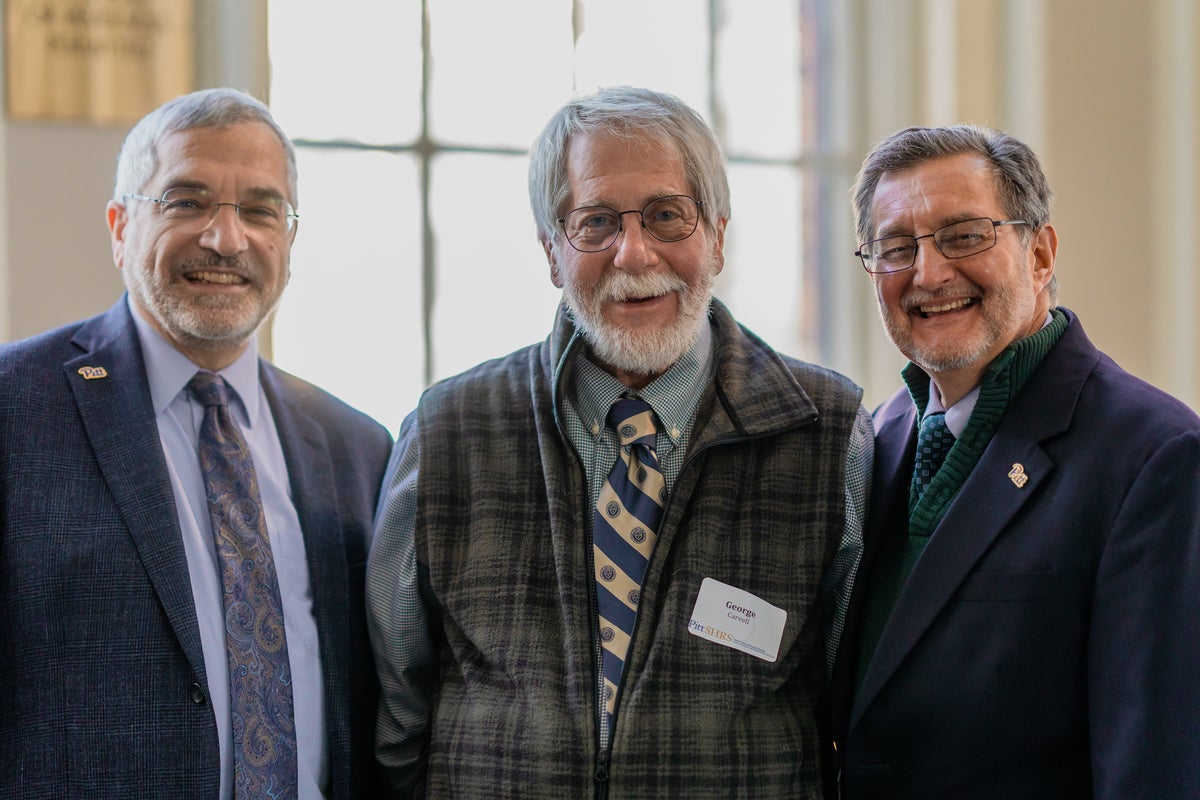 (left to right) SHRS Dean Anthony Delitto, Carvell and Department of Physical Therapy Chair Jay Irrgang