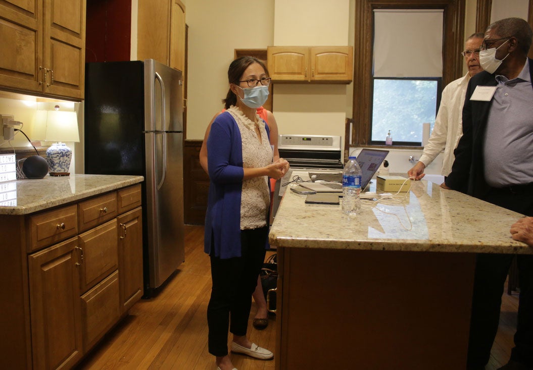 Associate Professor Ding Demonstrates Smart Home Technology in the Kitchen of the Healthy Home Lab