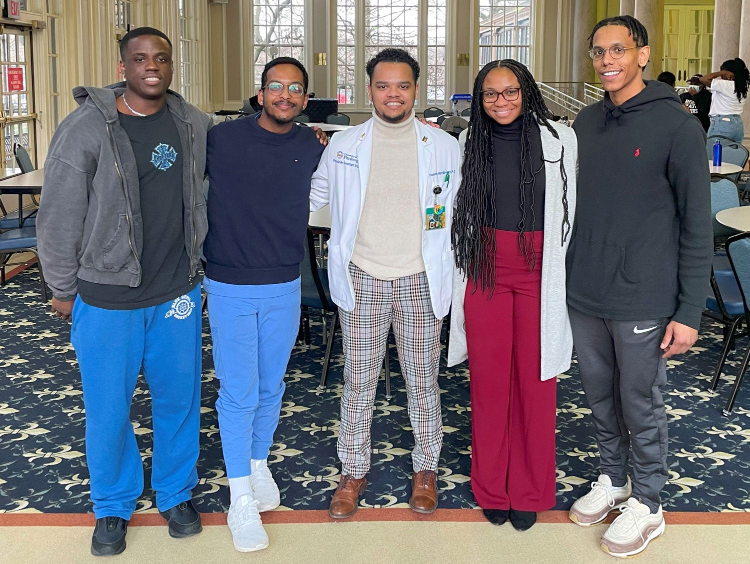 Pictured left to right: Second-year School of Medicine student Crandall Jones, Doctor of Dental Medicine student Thomas Fekeru, second-year Department of Physician Assistant Studies student Deionte Harrilla-Gray, Department of Occupational Therapy student Whitney Martin, first-year Department of Physician Assistant Studies student Malachi Perez