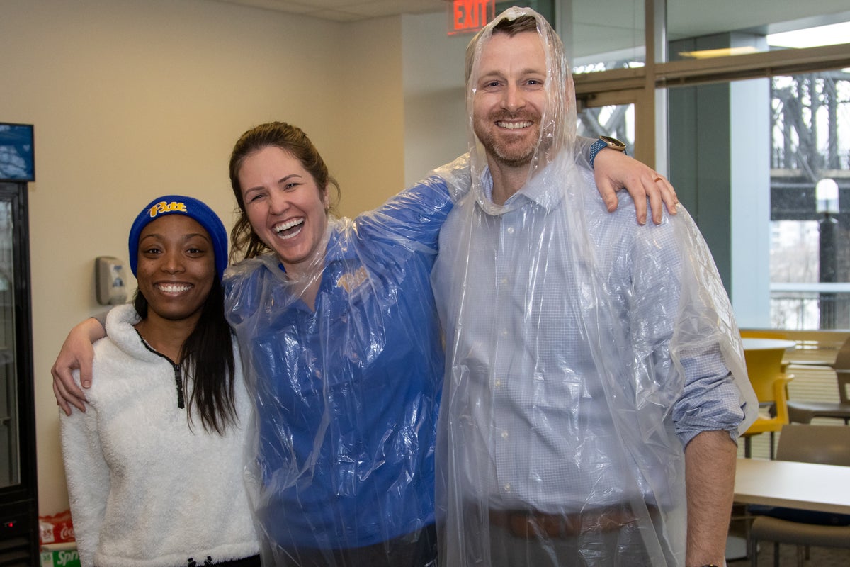 All in good fun: LaPrade, Shuman and Sprague ready for the pie throwing festivities