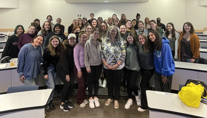 Bracken (second in from the right in the front row) among classmates in the Speech Science class, led by (fourth in from the right) Professor Susan Shaiman