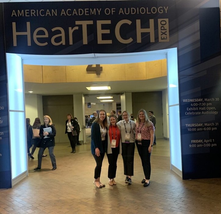 Bracken and fellow Audiology club members at the National Audiology Association conference HearTECH Expo