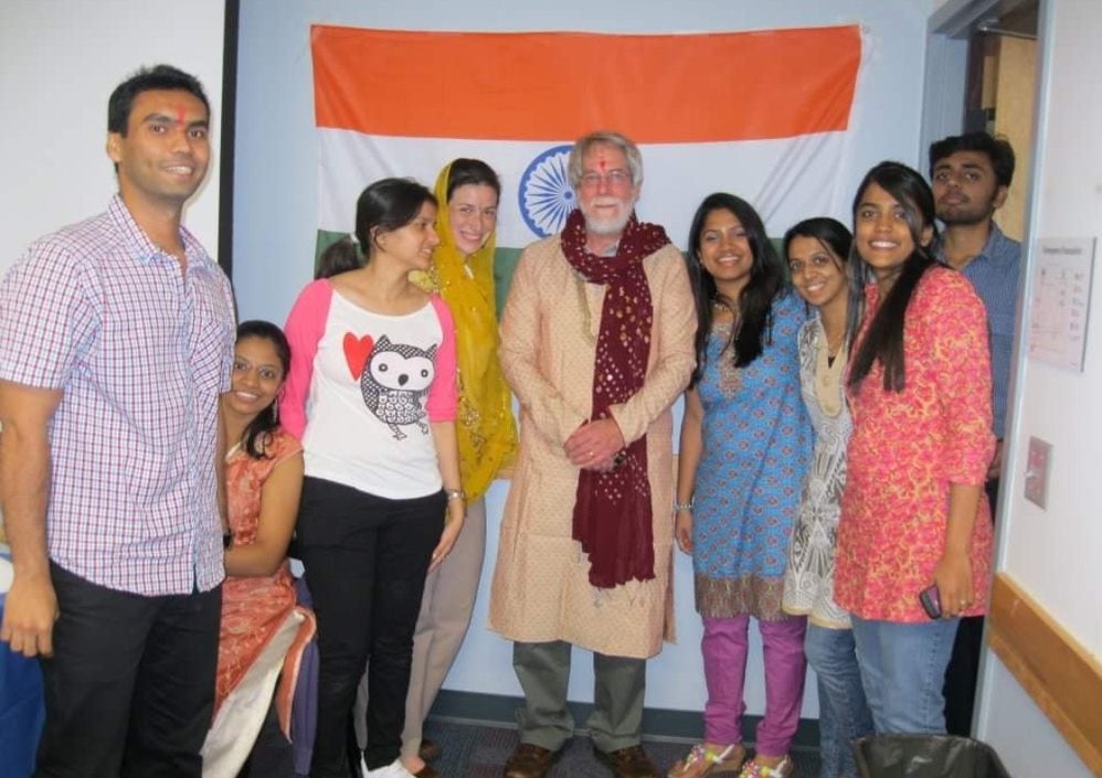 SHRS MSPT students and Dacosta celebrating International Week with Dr. George Carvell (center), dressed in Indian attire.