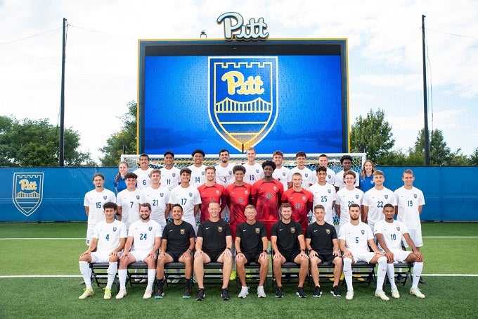 Proessl (bottom row, third from right) with the Pitt Men’s Soccer team