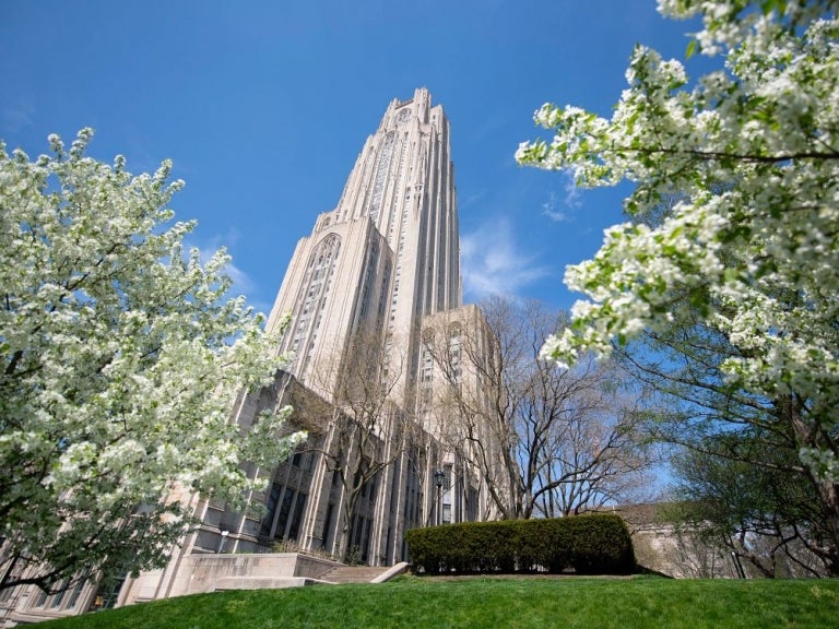Cathedral of Learning surrounded by spring flowers