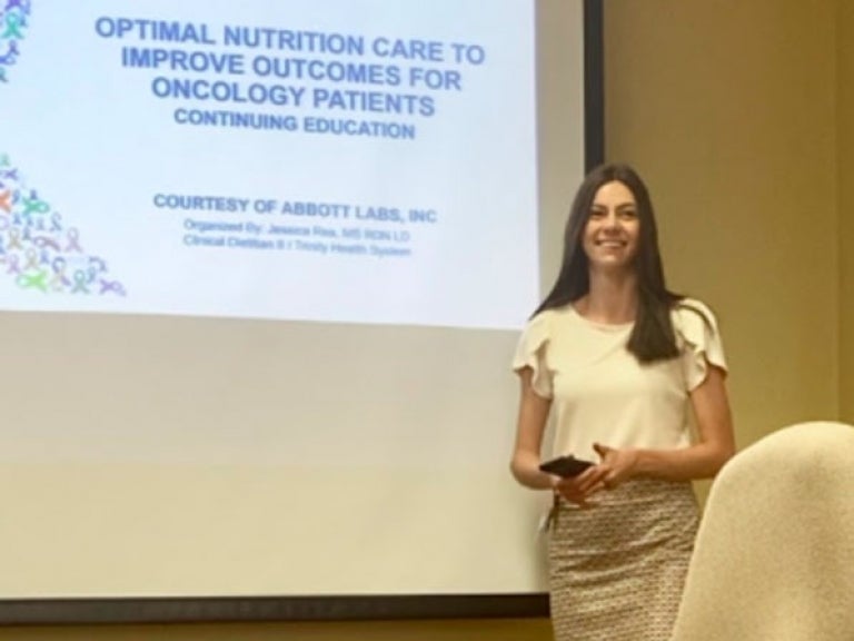 Clinical Dietitian Jessica Rea leading a continuing education course