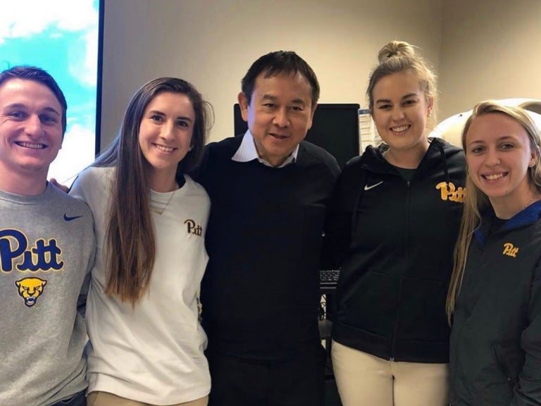 Dr. Freddie Fu with SHRS students