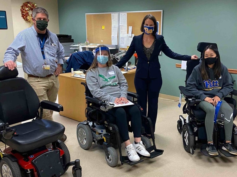 From left to right: Mark Schmeler, MRT Student in wheelchair, Mary Goldberg, and MRT Student in wheelchair during 2021 Deep Dive
