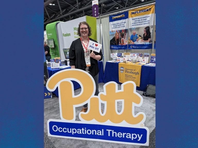 Emily Haffner at the School of Health and Rehabilitation Sciences OT booth at AOTA 2023