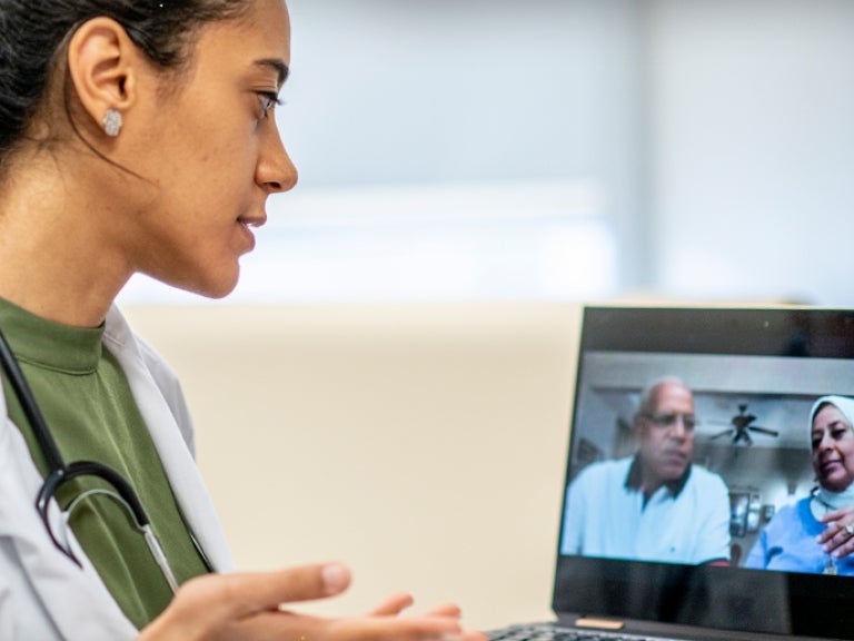 Physician Assistant working with patients virtually