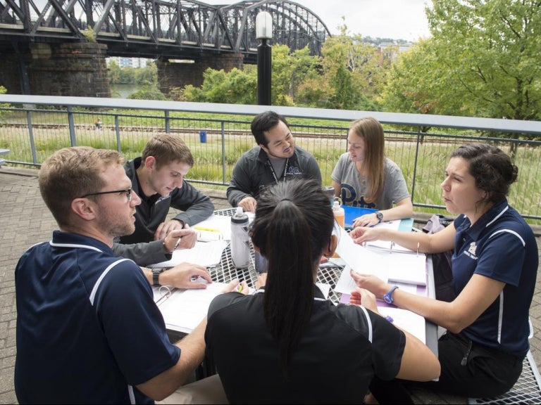 Physical Therapy students discuss school work at Bridgeside Point