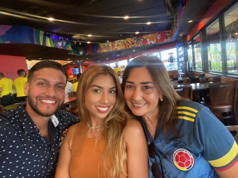 SHRS Counseling graduate student Jackilyn Garces (center) with her partner Edwin (left) and mother Fanny Maria Garces (right) in Cartegena, Colombia