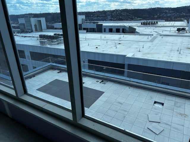View from Floor 10 window overlooking the Outdoor Event Space on the floor below.